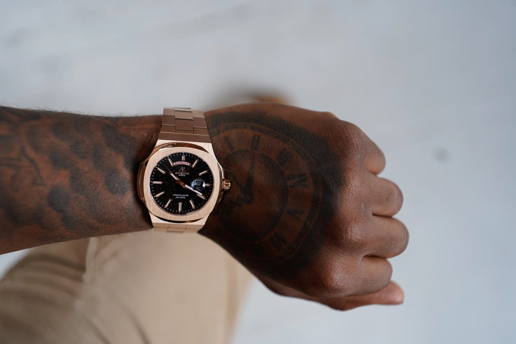 Rosegold/Black plain Constellation Day Date
